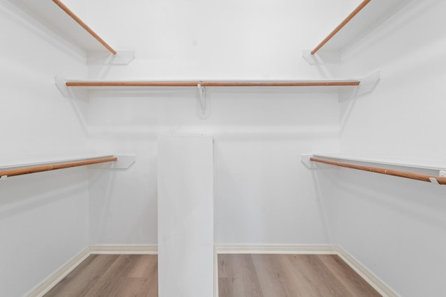 13611 Ortega Ln, Houston, TX 77083 - spacious closet featuring wood finished floors