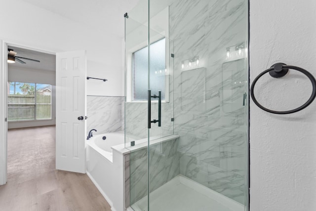 13611 Ortega Ln, Houston, TX 77083 - full bathroom with a garden tub, a marble finish shower, wood finished floors, and ceiling fan
