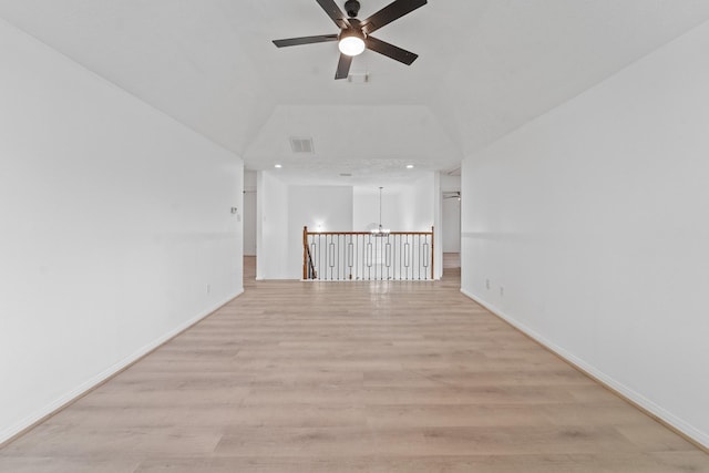 13611 Ortega Ln, Houston, TX 77083 - unfurnished room featuring ceiling fan, light wood finished floors, recessed lighting, a chandelier, and lofted ceiling