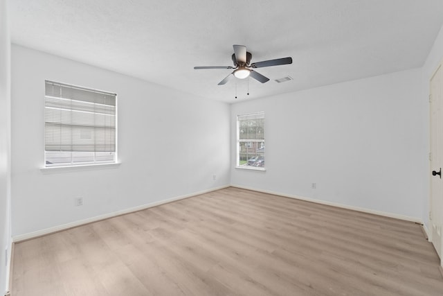 13611 Ortega Ln, Houston, TX 77083 - unfurnished room with light wood-style floors and ceiling fan