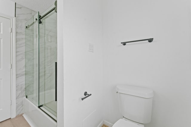 13611 Ortega Ln, Houston, TX 77083 - bathroom featuring toilet and shower / bath combination with glass door