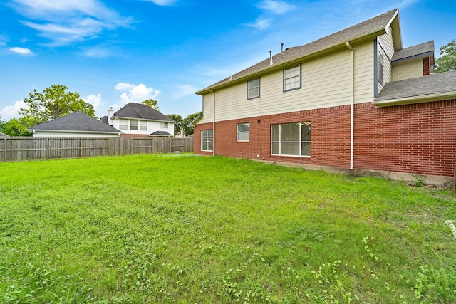 13611 Ortega Ln, Houston, TX 77083 - rear view of house with brick siding