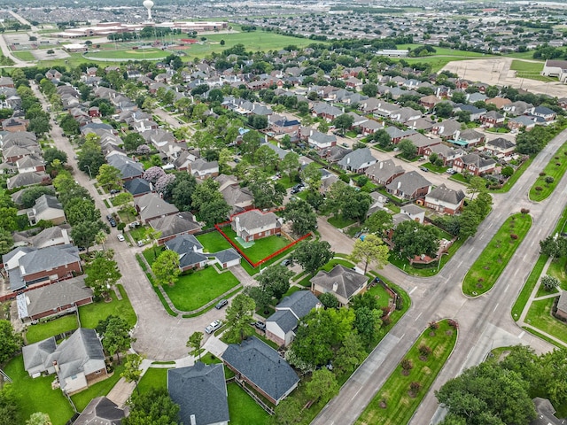 13611 Ortega Ln, Houston, TX 77083 - aerial view of property and surrounding area featuring property boundaries highlighted and nearby suburban area