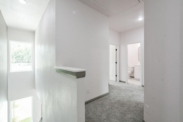 8306 E Tidwell Rd, Houston, TX 77028 - hallway with attic access, carpet, and recessed lighting