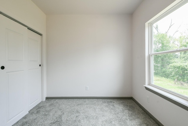 8306 E Tidwell Rd, Houston, TX 77028 - unfurnished bedroom with carpet flooring and baseboards