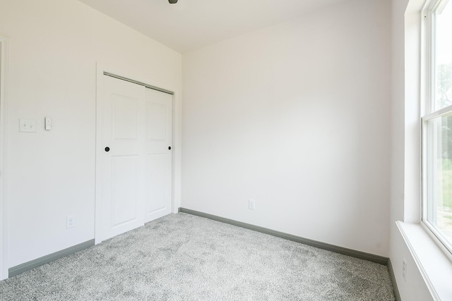 8306 E Tidwell Rd, Houston, TX 77028 - unfurnished bedroom with carpet and a closet