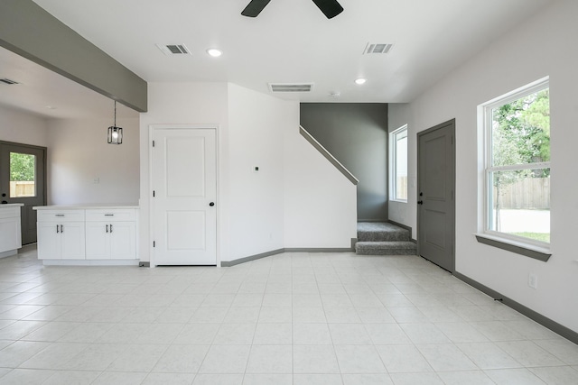 8306 E Tidwell Rd, Houston, TX 77028 - unfurnished living room featuring ceiling fan and recessed lighting