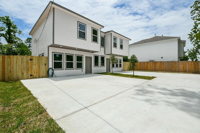 8306 E Tidwell Rd, Houston, TX 77028 - back of property with a patio and a fenced backyard