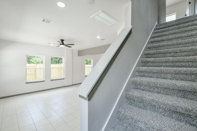 8306 E Tidwell Rd, Houston, TX 77028 - staircase with ceiling fan, plenty of natural light, recessed lighting, and tile patterned flooring