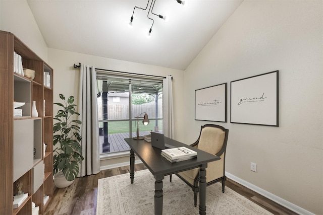 2322 Old Oak Ln, Kingwood, TX 77339 - office area featuring vaulted ceiling and wood finished floors
