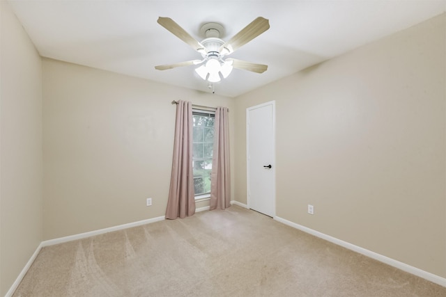 2322 Old Oak Ln, Kingwood, TX 77339 - spare room featuring light colored carpet and a ceiling fan