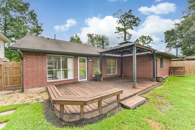 2322 Old Oak Ln, Kingwood, TX 77339 - back of house featuring a gazebo, brick siding, a deck, and roof with shingles