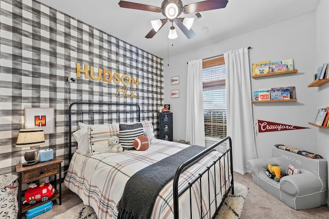 22402 Threefold Ridge Dr, Hockley, TX 77447 - bedroom with carpet, an accent wall, and a ceiling fan