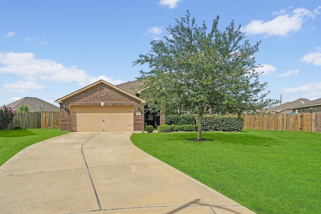 22402 Threefold Ridge Dr, Hockley, TX 77447 - view of front facade with brick siding, driveway, and a garage