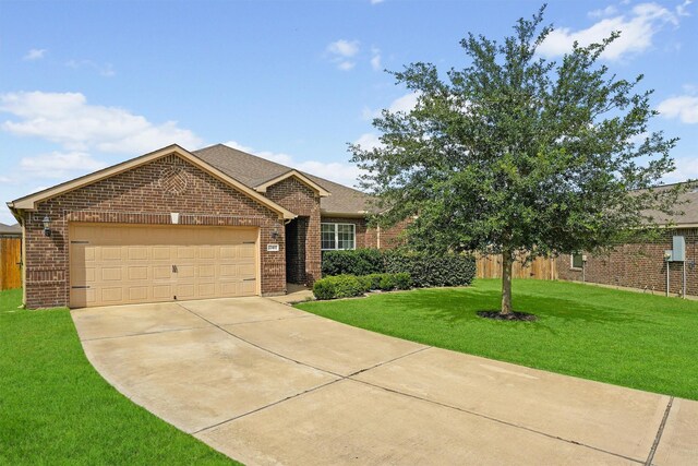 22402 Threefold Ridge Dr, Hockley, TX 77447 - view of front of home with brick siding, an attached garage, and concrete driveway