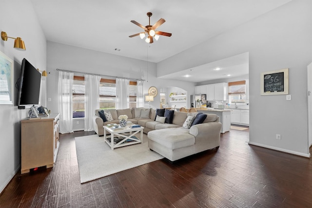 22402 Threefold Ridge Dr, Hockley, TX 77447 - living area featuring ceiling fan and dark wood-style floors