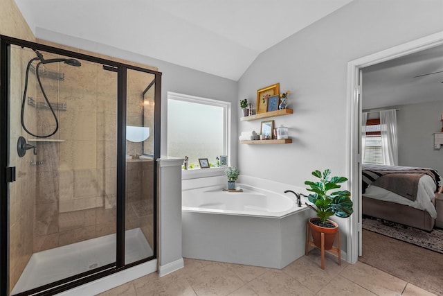 22402 Threefold Ridge Dr, Hockley, TX 77447 - ensuite bathroom featuring a bath, a stall shower, vaulted ceiling, and tile patterned flooring