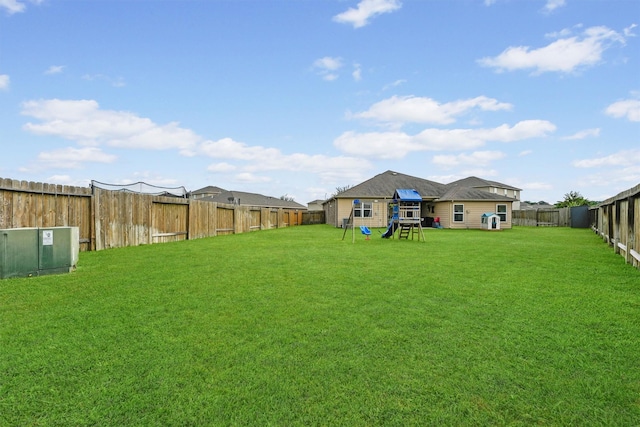 22402 Threefold Ridge Dr, Hockley, TX 77447 - fenced backyard with a playground