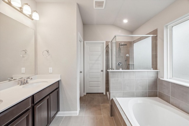 7222 Melrose Ln, Rosharon, TX 77583 - bathroom with double vanity, a bath, a shower stall, tile patterned floors, and healthy amount of natural light