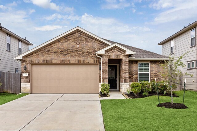 7222 Melrose Ln, Rosharon, TX 77583 - view of front facade with brick siding, concrete driveway, a shingled roof, an attached garage, and stone siding