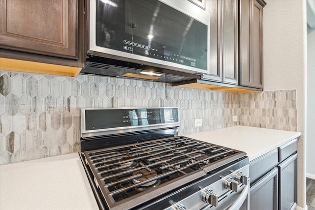 7222 Melrose Ln, Rosharon, TX 77583 - kitchen with stainless steel appliances, light countertops, and tasteful backsplash