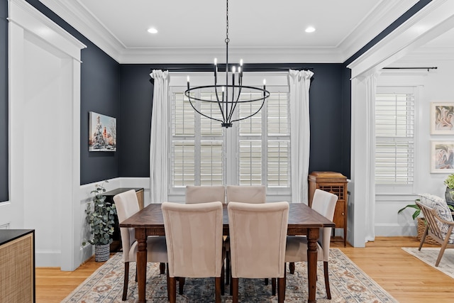 1603 Columbia St, Houston, TX 77008 - dining space with a chandelier, ornamental molding, and light wood-type flooring
