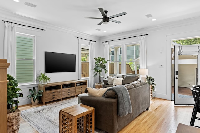 1603 Columbia St, Houston, TX 77008 - living room featuring ceiling fan, light wood-style flooring, crown molding, and recessed lighting