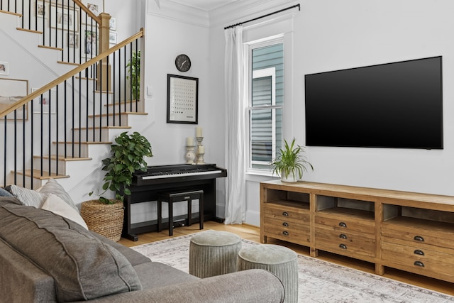 1603 Columbia St, Houston, TX 77008 - living room featuring ornamental molding, stairway, and wood finished floors