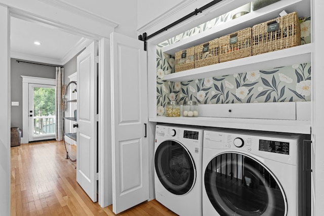 1603 Columbia St, Houston, TX 77008 - washroom with washing machine and dryer, light wood finished floors, and ornamental molding