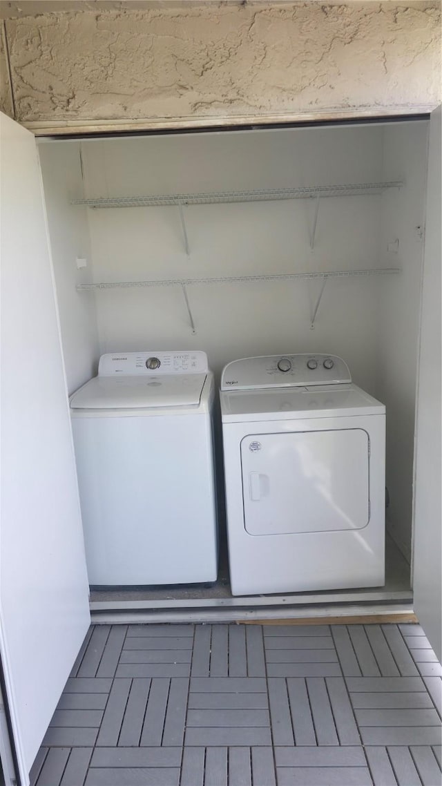 2818 S Bartell Dr Unit 13, Houston, TX 77054 - laundry room featuring washing machine and dryer