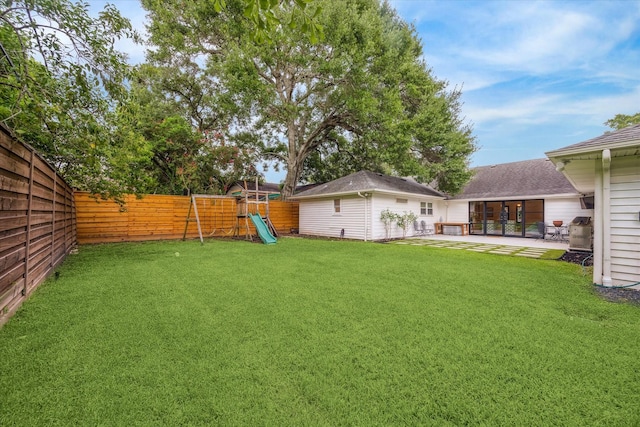 7730 Skyline Dr, Houston, TX 77063 - fenced backyard featuring a playground and a patio area