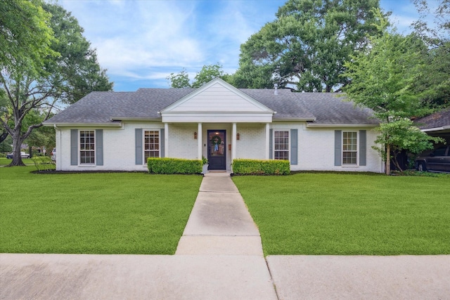 7730 Skyline Dr, Houston, TX 77063 - view of front of house with roof with shingles and a front yard