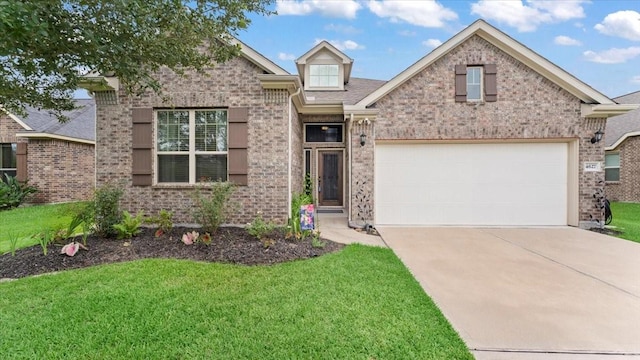 4627 Western Brook Dr, Spring, TX 77388 - view of front facade with brick siding, driveway, and a front lawn