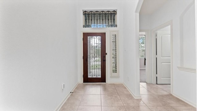 4627 Western Brook Dr, Spring, TX 77388 - foyer with arched walkways and light tile patterned flooring