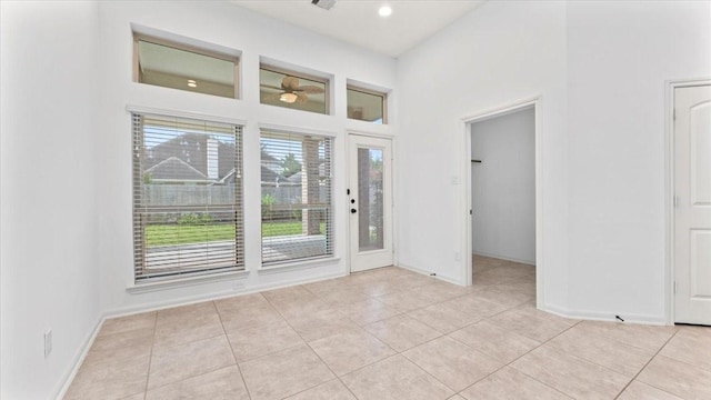 4627 Western Brook Dr, Spring, TX 77388 - entryway featuring light tile patterned floors and a high ceiling