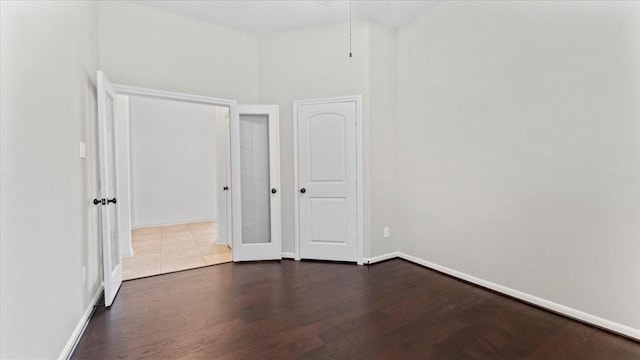 4627 Western Brook Dr, Spring, TX 77388 - unfurnished bedroom featuring dark wood finished floors