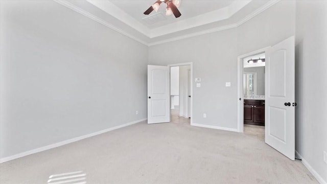 4627 Western Brook Dr, Spring, TX 77388 - unfurnished bedroom featuring light colored carpet, ensuite bathroom, ornamental molding, ceiling fan, and a tray ceiling