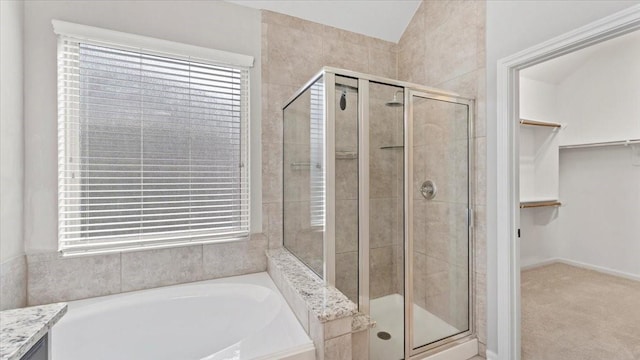 4627 Western Brook Dr, Spring, TX 77388 - full bathroom featuring a bath, a stall shower, and a spacious closet