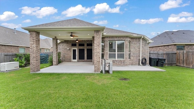 4627 Western Brook Dr, Spring, TX 77388 - rear view of property featuring ceiling fan, a patio area, and a fenced backyard