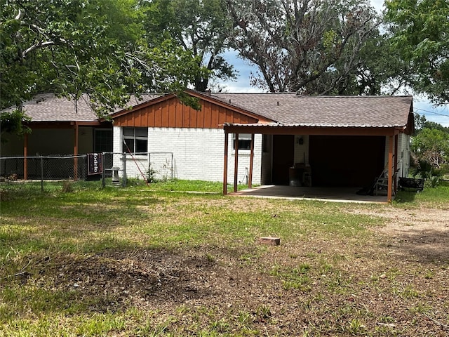 10005 Cypress N Houston Rd, Houston, TX 77070 - rear view of property with brick siding and a shingled roof