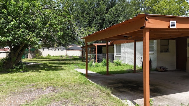 10005 Cypress N Houston Rd, Houston, TX 77070 - view of yard with an attached carport