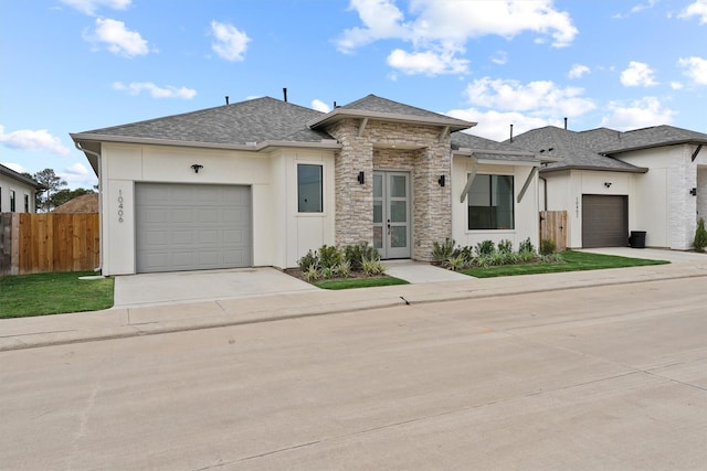 10406 Grove Row Ave, Richmond, TX 77407 - view of front facade featuring concrete driveway, an attached garage, and a shingled roof