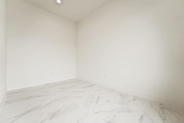 10406 Grove Row Ave, Richmond, TX 77407 - spare room featuring recessed lighting and light marble finish flooring