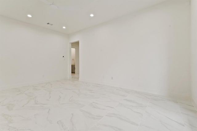 10406 Grove Row Ave, Richmond, TX 77407 - spare room featuring recessed lighting and light marble finish floors
