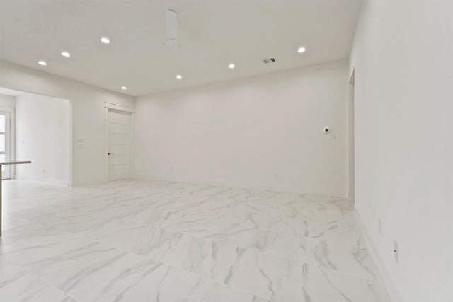 10406 Grove Row Ave, Richmond, TX 77407 - unfurnished room with recessed lighting and light marble finish floors