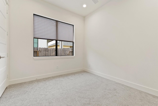 10406 Grove Row Ave, Richmond, TX 77407 - carpeted empty room featuring baseboards and recessed lighting