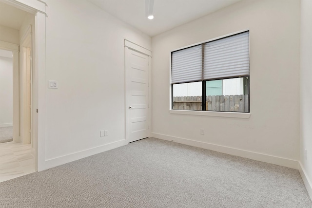 10406 Grove Row Ave, Richmond, TX 77407 - unfurnished bedroom featuring light carpet and recessed lighting