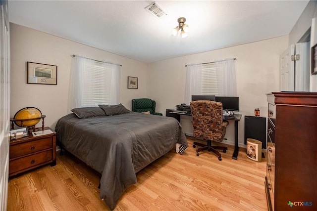 40 Sailfish Lndg, Port Lavaca, TX 77979 - bedroom with light wood finished floors and a desk