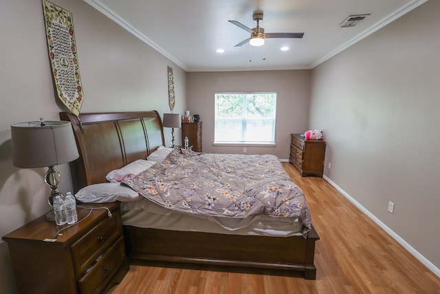 7264 Regency Square Ct, Houston, TX 77036 - bedroom featuring light wood-type flooring, crown molding, recessed lighting, and a ceiling fan