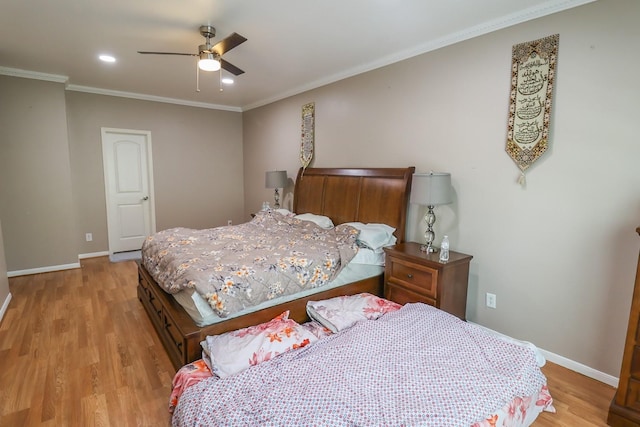 7264 Regency Square Ct, Houston, TX 77036 - bedroom featuring light wood-type flooring, crown molding, a ceiling fan, and recessed lighting